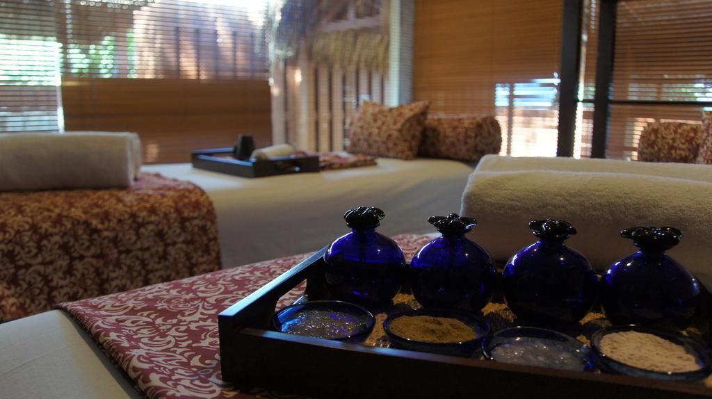 แซนด์ แอนด์ แซนเดิล เดซารู บีช รีสอร์ต แอนด์ สปา Hotel เดอซารู ภายนอก รูปภาพ A spa at a hotel