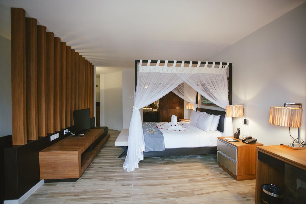 แซนด์ แอนด์ แซนเดิล เดซารู บีช รีสอร์ต แอนด์ สปา Hotel เดอซารู ภายนอก รูปภาพ Deluxe Room