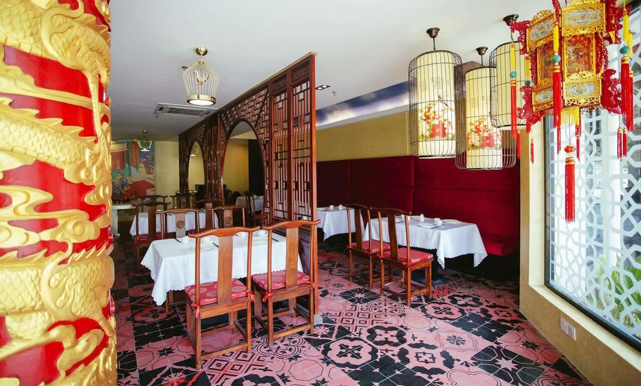 แซนด์ แอนด์ แซนเดิล เดซารู บีช รีสอร์ต แอนด์ สปา Hotel เดอซารู ภายนอก รูปภาพ Interior of a restaurant in Beijing